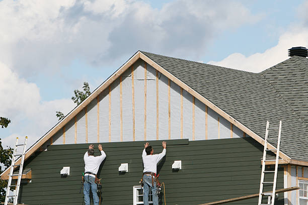 Professional Siding technician working in Salem, OH